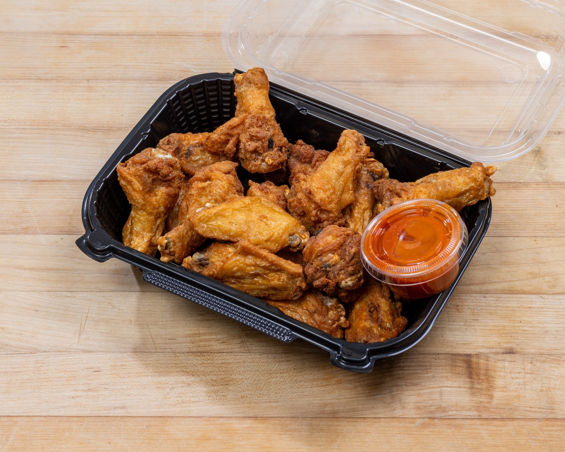 Our Famous Ameci Hot N' Crispy Wings
