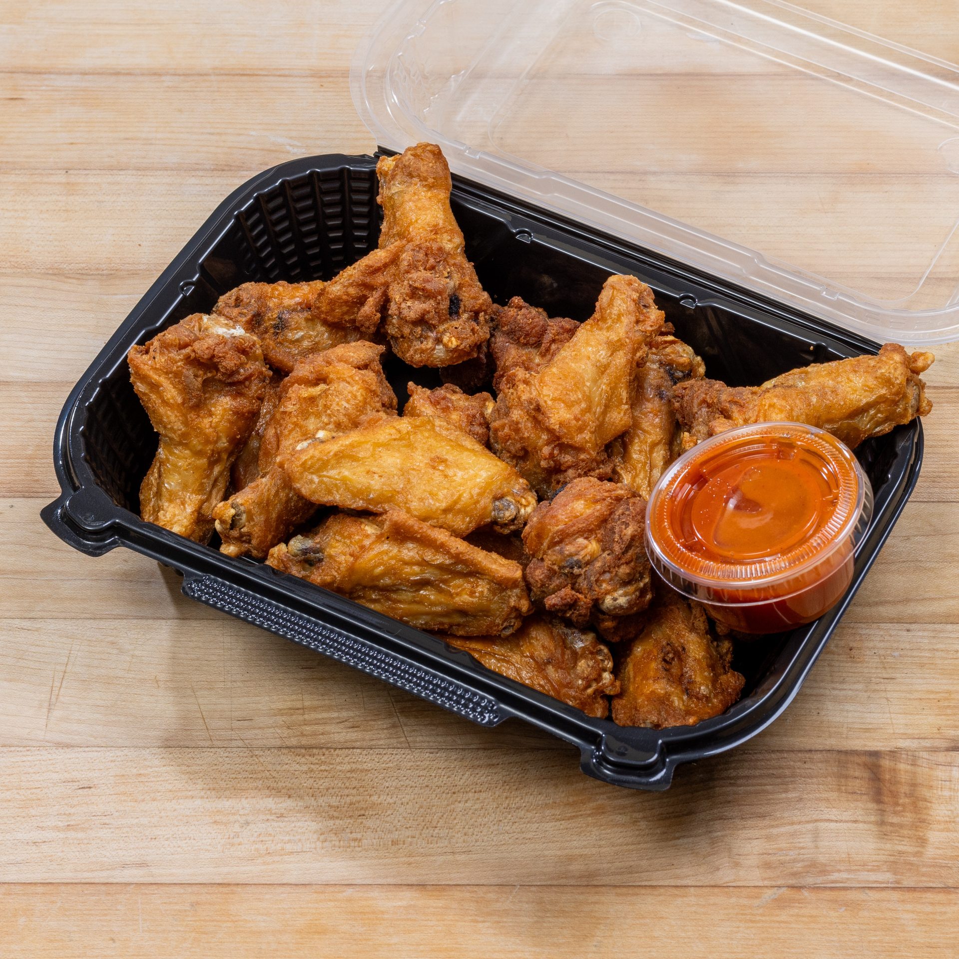 Our Famous Ameci Hot N' Crispy Wings